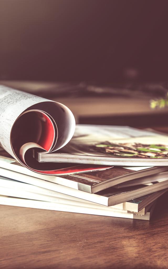 selective focus of the stacking magazine place on table in living room