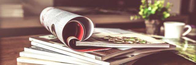 selective focus of the stacking magazine place on table in living room