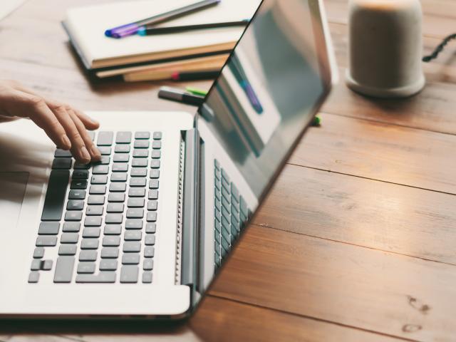 Male hands with laptop