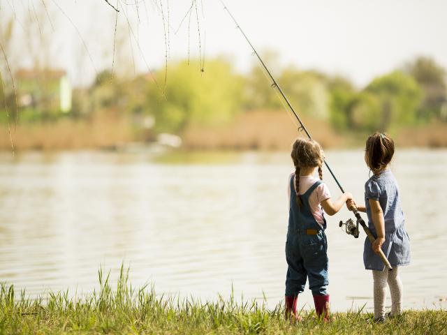 Two little girls fishing