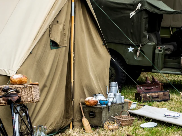 SAINTE MERE L'EGLISE, NORMANDY, FRANCE - JUNE 6 2023. Second world war commemoration. Military camp reconstitution Tent and military american war equipments.